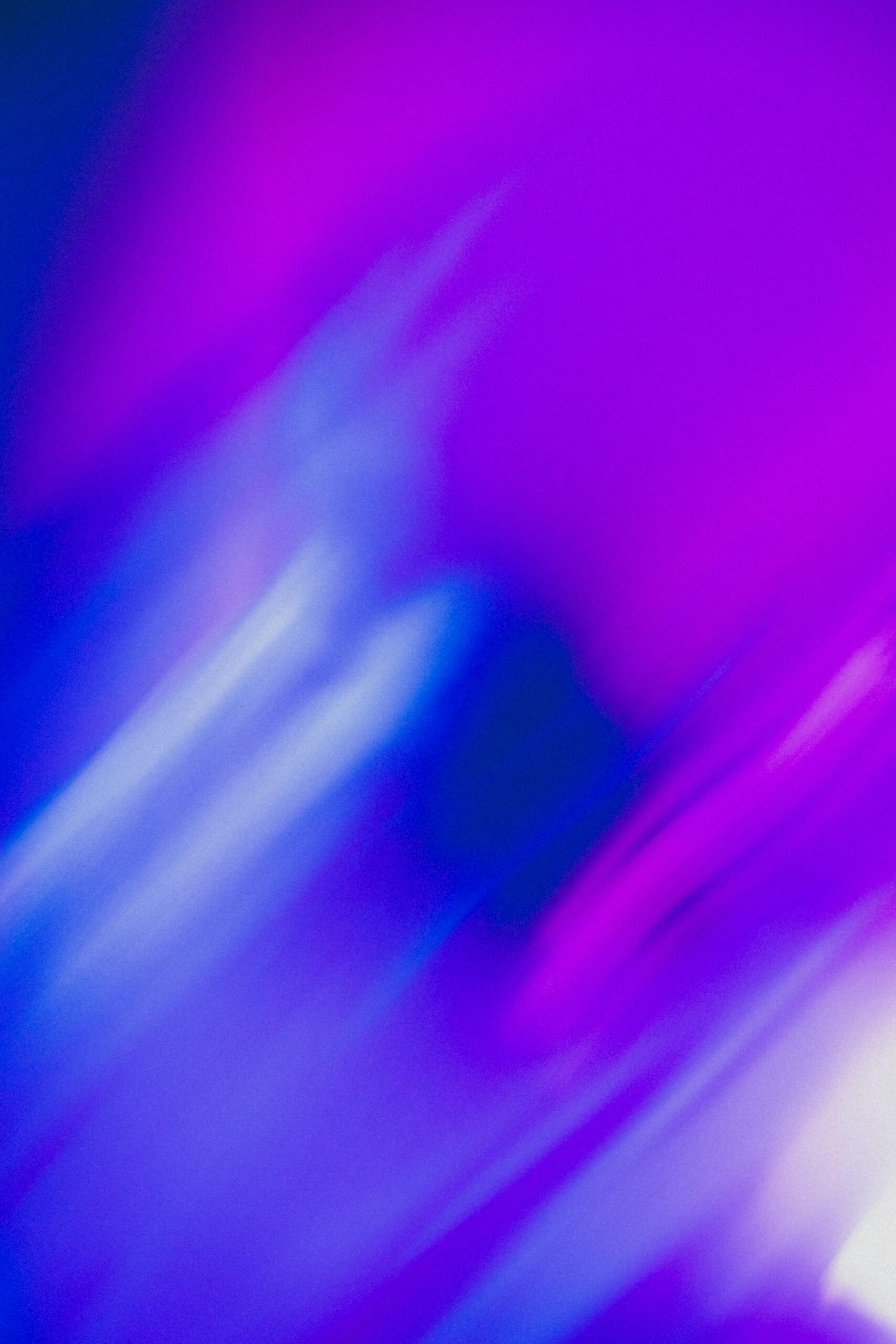 Dynamic abstract gradient in vivid pink and blue tones, perfect for creative projects.